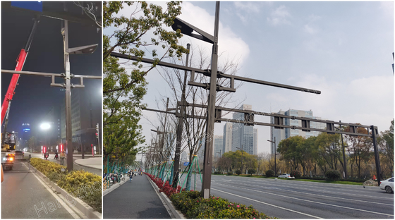 چین ستون های نورپردازی سفارشی تیر چراغ خیابان فولادی با بازوهایی برای نصب دوربین تامین کننده